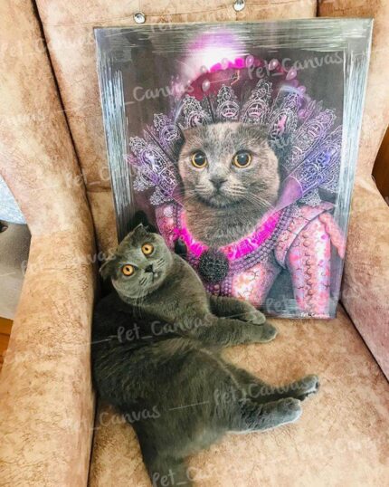 A gray cat with orange eyes lounges on a tan chair beside its portrait, "The Pink Noble Lady #11 – Custom Design Pet Canvas," which features the cat in Renaissance-style attire with a ruffled collar and ornate clothing.