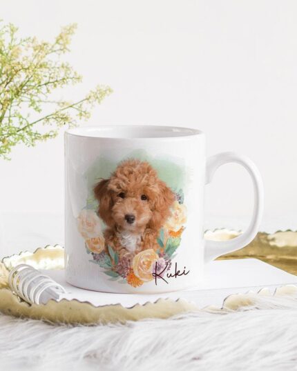 The Flower Wreath Custom Design Mug #1 features a curly-haired dog and the name Kuki, displayed on a gold tray with a notepad and pen beside flowers—ideal for fans of custom pet canvas art.