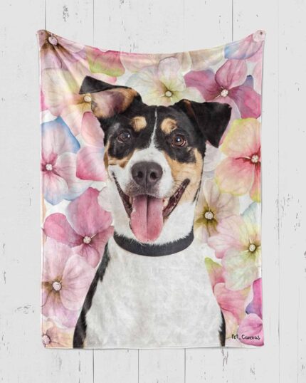 A Custom Pop Art Blanket – Floral Patterns displays a joyful black, white, and tan dog with its tongue out against vibrant pink and purple flowers—a charming custom pet design perfect for brightening any room.