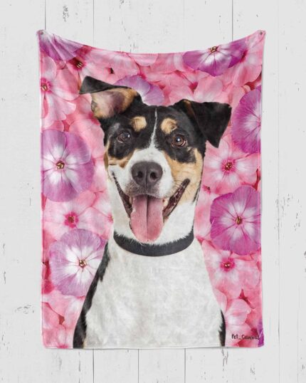 The Custom Pop Art Blanket – Floral Patterns showcases a joyful black, white, and tan dog with its tongue out on a vivid pink flower background—ideal inspiration for designing your own personalized pet canvas.