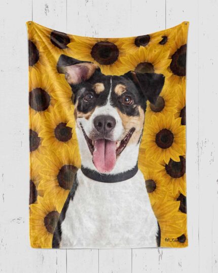The Custom Pop Art Blanket – Floral Patterns showcases a joyful black, white, and brown dog with its tongue out, centered among vibrant yellow sunflowers, inspired by custom pet canvas art and displayed on a white wooden wall.
