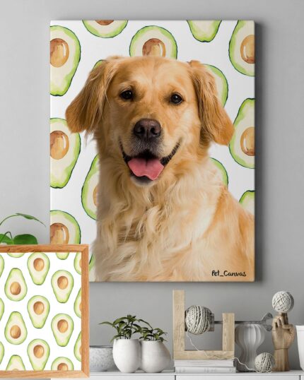 A "Pop Art – Fruits" framed pet canvas of a golden retriever with a joyful face and an avocado pattern background hangs on the wall; below, an avocado-patterned "Pop Art – Fruits" frame rests on a shelf near potted plants.