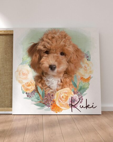 A custom design pet canvas features a curly brown and white puppy surrounded by illustrated pastel flowers and greenery. The name “Kiki” is written in cursive at the bottom right. The pet canvas rests against a wall on a wooden floor.
