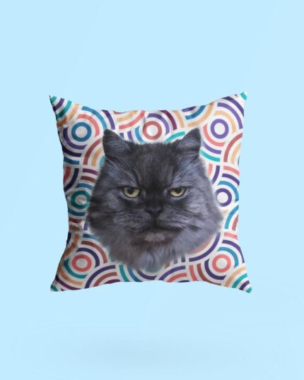 The Personalized Pop Art Pillow – Donut showcases a realistic grumpy gray cat’s face on colorful overlapping circles, making it a perfect custom accent for pet art lovers.