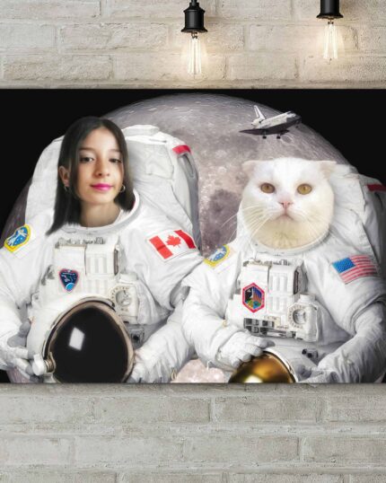 A photo inspired by "The lady with an Ermine #3 - Custom Pet Canvas Painting" features a woman and a white cat in astronaut suits with Canadian and American flags, set before a moon backdrop—ideal for unique custom pet canvas art.