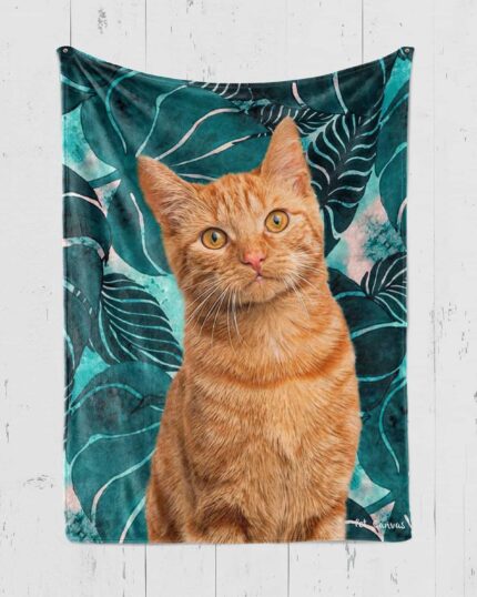 A Custom Design Pop-Art Blanket – Leaf #8 is displayed on a white wooden wall, featuring an orange tabby cat with yellow eyes before a green and teal leafy background—showcasing unique pet-themed art.
