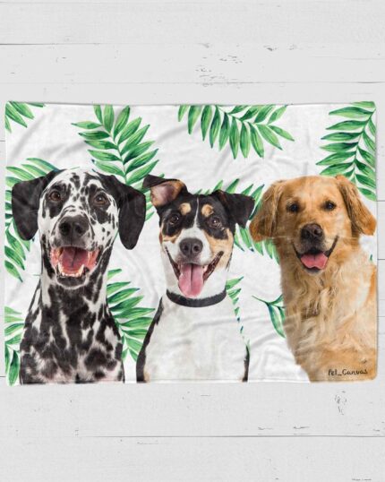 Three dogs—a Dalmatian, a black and white dog, and a golden retriever—sit side by side, smiling against a white backdrop with green leafy branches, ideal for the Custom Design Pop-Art Blanket – Leaf #9 to add charm to any room.