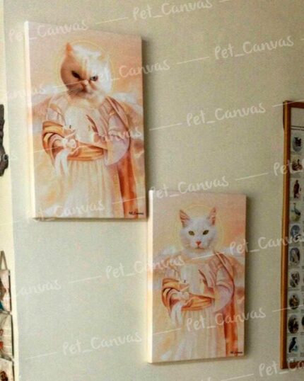 Two "Special Design Canvas Painting – Angel #1" portraits of white cats in angelic robes hang on a light wall, adding classical elegance and whimsy to any space.