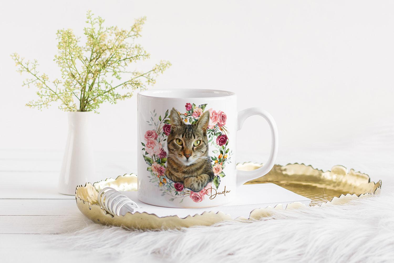 The Flower Wreath Custom Design Mug #3 Features A Realistic Cat Portrait And Is Displayed On A Gold Tray Surrounded By Colorful Flowers, A Notepad, Pen, And Greenery Atop A White, Fluffy Surface. The Flower Wreath Custom Design Mug #3 features a realistic cat portrait and is displayed on a gold tray surrounded by colorful flowers, a notepad, pen, and greenery atop a white, fluffy surface.
