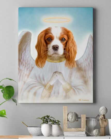 The Angel #3 - Custom Pet Canvas featuring a dog with angel wings, halo, and folded paws hangs on a gray wall above a light wood shelf adorned with plants and ornaments.