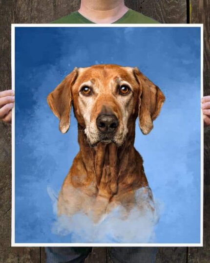 Someone holds the Masterpiece Portrait - Blue, a custom canvas showing a brown dog with droopy ears and soulful eyes on a blue background. The artwork softly fades at the bottom, emphasizing the distinct style of canvas printing.