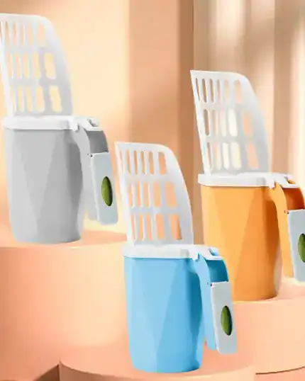 Three LitterLux Advanced Cat Litter Scoops in gray, blue, and yellow are displayed on beige steps. Each scoop features a white grid handle and a green button—ideal for organizing supplies during your next custom pet canvas project.