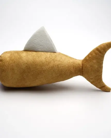 The Pawdaz Catnip Fish Toy, with a brown body, forked tail fin, white dorsal fin, and red tip where the head would be, offers anxiety relief and interactive fun for cats—inspiration for your next custom pet canvas. Displayed on a plain white background.