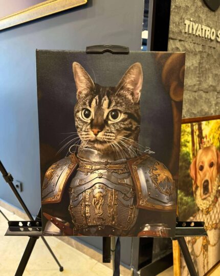 The "Sir Dracula – Custom Design Pet Canvas" features a tabby cat in ornate medieval armor, posed regally on an easel, with part of a dog portrait visible in the background of this unique artwork.