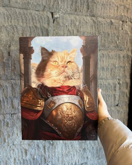 A hand holds the "Gallant Guardian - Custom Warrior Pet Portrait," featuring an orange cat as a medieval knight in ornate golden armor and a red cape, set against stone columns and a textured stone wall.