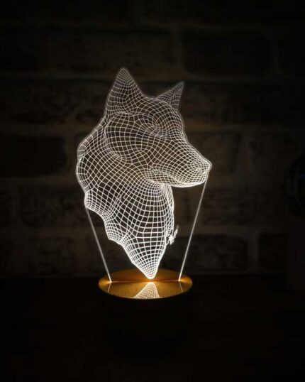 The 3D Wolf Head LED Night Lamp features glowing white wireframe lines on a small round base, making it an ideal match for custom design pet canvas or unique canvas printing, adding a striking touch to any room.